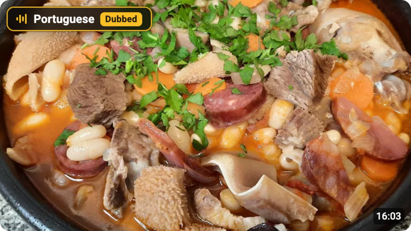 YouTube thumbnail with an amber Dubbed chip: the English audio is an AI dub of a Portuguese original
